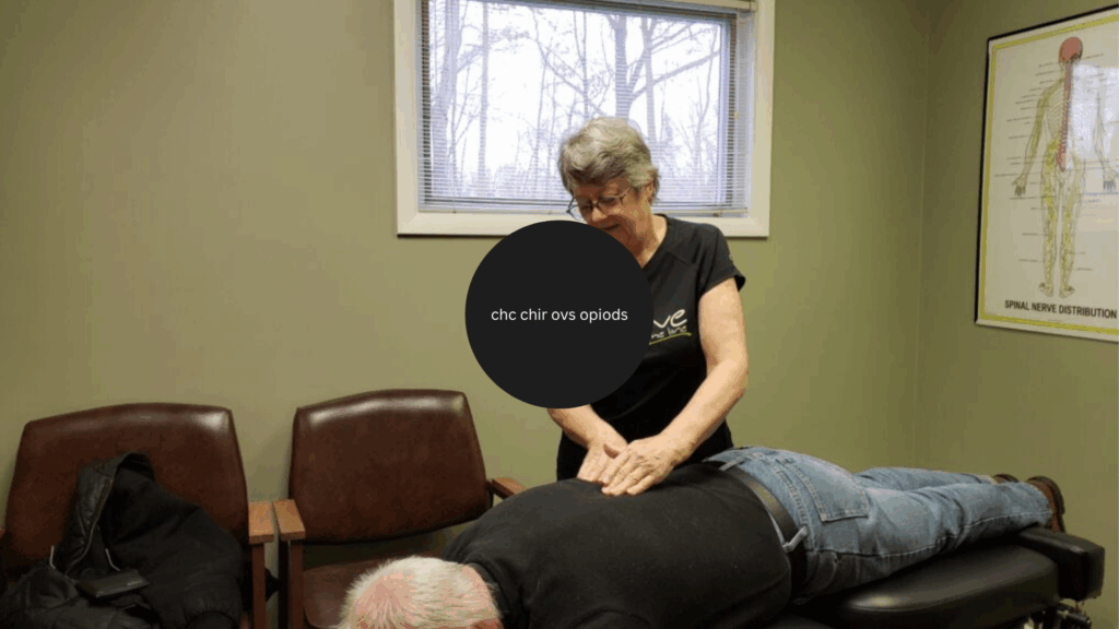 Dr Hafer is giving a chiropractic adjustment to a male patient